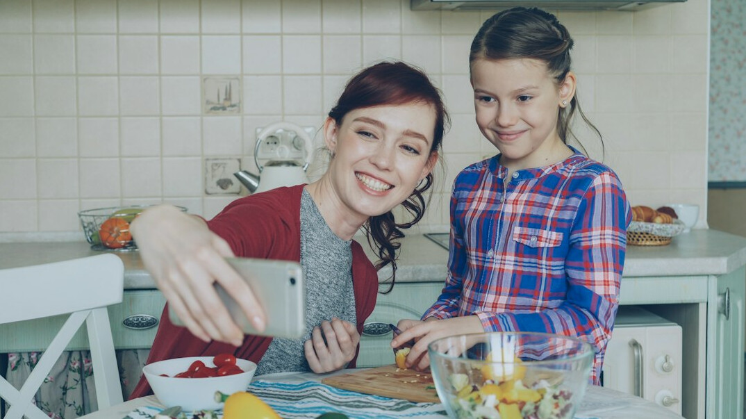 family budgeting at kitchen table