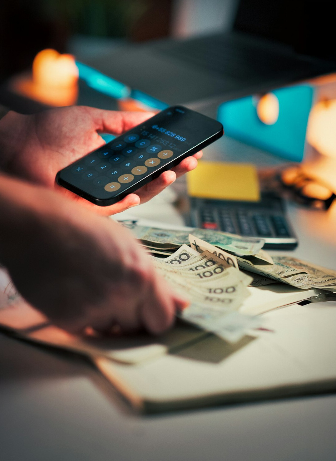person calculating expenses