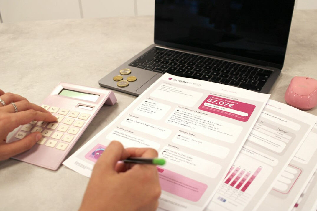 person writing financial goals